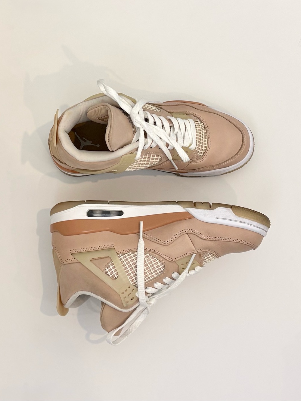 Jordan Retro 4 Sneakers in Beige and White